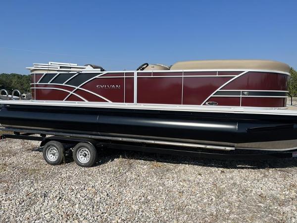 Slide: The Image of 2023 Sylvan Mirage 8524 LZ pontoon boat on a trailer. - 1