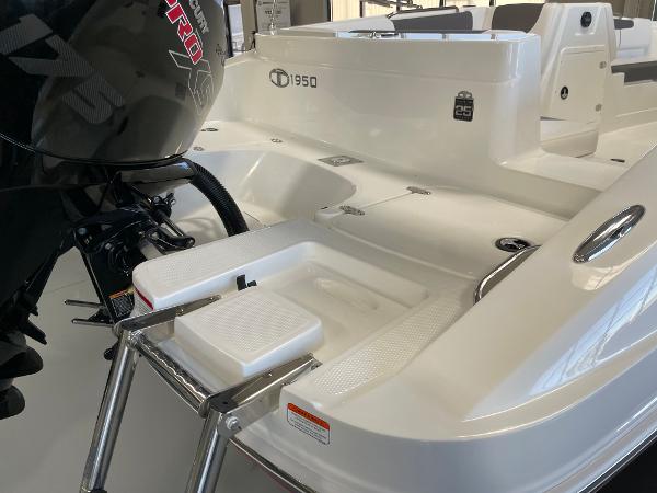 Slide: The Image of Tahoe 1950 boat 2023 model with outboard motor and swim platform. - 12