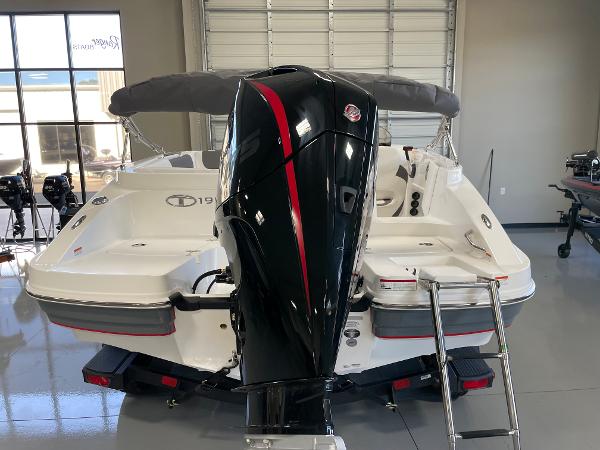 Slide: The Image of Tahoe 1950 boat 2023 model with powerful outboard motor in showroom. - 6