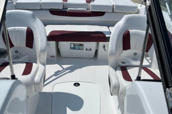 Slide: The Image of 2023 Tahoe 200 S boat interior with white and maroon seating. - 8