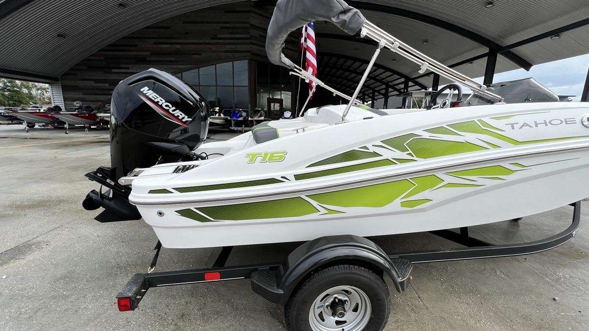 Slide: The Image of 2021 Tahoe T16 boat with Mercury outboard motor on trailer. - 18