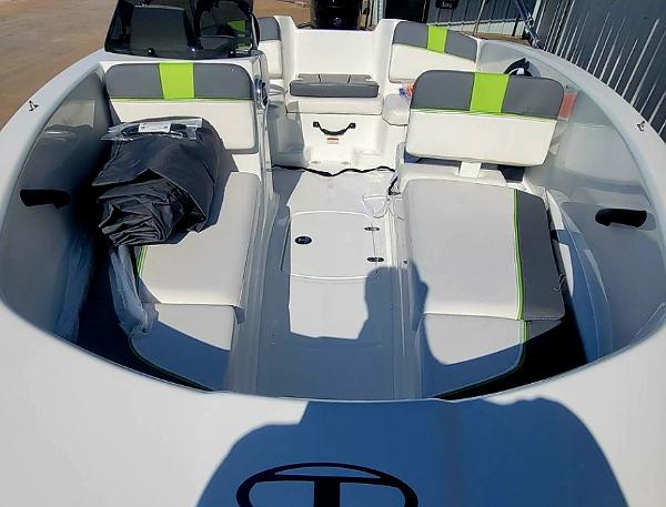 Slide: The Image of 2024 Tahoe T16 boat interior with white and green seating. - 1