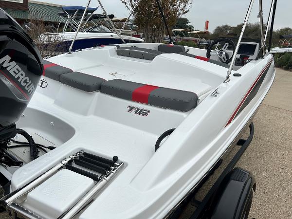 Slide: The Image of 2024 Tahoe T16 boat with Mercury engine, docked and ready for use. - 3