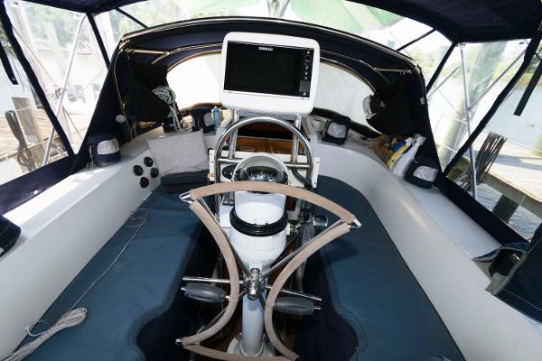 Slide: The Image of Cockpit of a 1988 Tayana 52 sailboat with navigation equipment. - 14