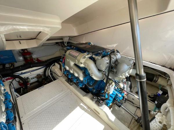 Slide: The Image of Engine compartment of 2012 Tiara Yachts 3100 Coronet, showcasing detailed mechanical components. - 22