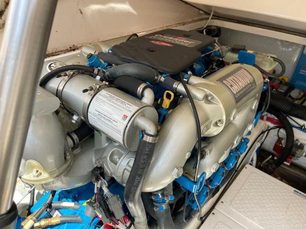 Slide: The Image of Engine compartment of a 2012 Tiara Yachts 3100 Coronet, showcasing detailed mechanical components. - 23