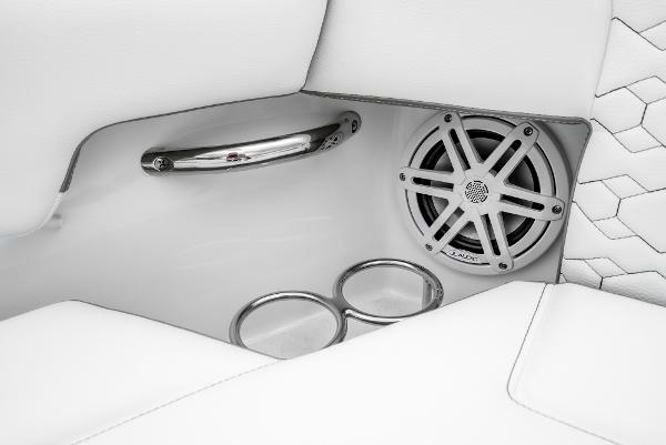 Slide: The Image of 2024 Tiara Yachts 34LS interior detail with speaker, cup holders, and handle. - 14