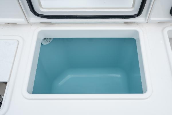Slide: The Image of Livewell compartment on a 2024 Tiara Yachts 34LS boat. - 24