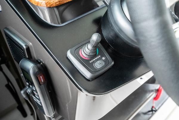 Slide: The Image of Close-up of the control panel on a 2024 Tiara Yachts 34LS. - 40