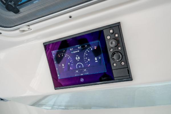 Slide: The Image of 2024 Tiara Yachts 34LS dashboard display showing navigation and system controls. - 45