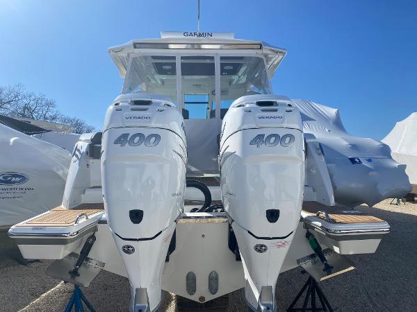 Slide: The Image of 2021 Tiara Yachts 34 LX with twin 400 Verado engines, rear view. - 12