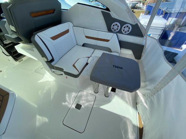 Slide: The Image of 2021 Tiara Yachts 34 LX interior with seating and table, featuring modern design elements. - 19