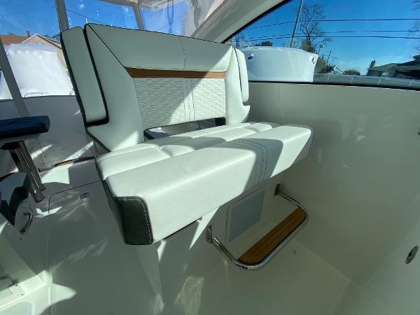 Slide: The Image of 2021 Tiara Yachts 34 LX interior seating with modern design and premium materials. - 21