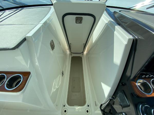 Slide: The Image of 2021 Tiara Yachts 34 LX interior storage compartment, featuring sleek design and ample space. - 27