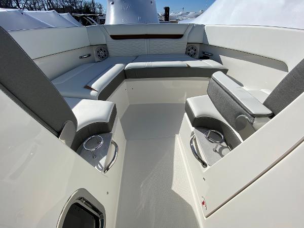 Slide: The Image of 2021 Tiara Yachts 34 LX interior with spacious seating and cup holders. - 30