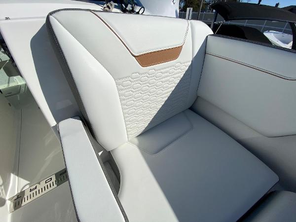 Slide: The Image of Luxurious seating on 2021 Tiara Yachts 34 LX, featuring elegant white upholstery. - 31