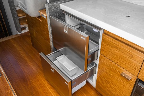 Slide: The Image of Modern kitchen drawers in 2020 Tiara Yachts 39 Coupe, featuring sleek stainless steel design. - 15
