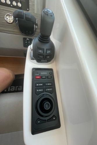 Slide: The Image of Control panel of 2020 Tiara Yachts 39 Coupe with joystick and buttons. - 21
