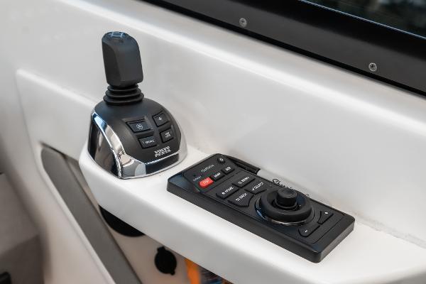 Slide: The Image of Control panel of 2020 Tiara Yachts 39 Coupe with joystick and buttons. - 24