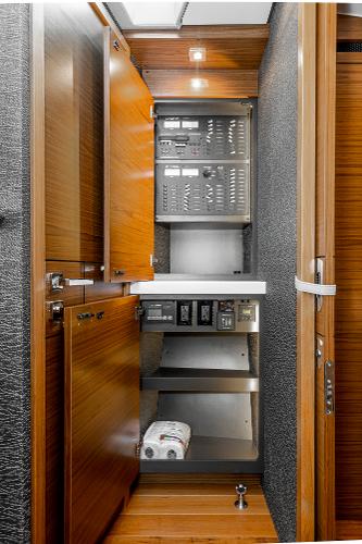 Slide: The Image of Electrical panel and storage in 2020 Tiara Yachts 39 Coupe interior. - 27