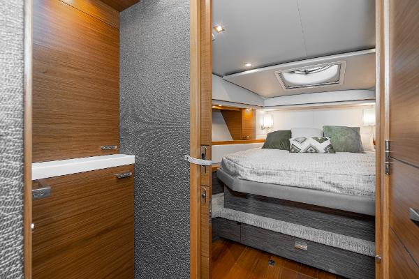 Slide: The Image of Luxurious cabin interior of 2020 Tiara Yachts 39 Coupe with modern wood finishes. - 29