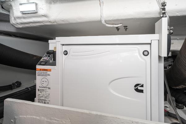 Slide: The Image of Engine compartment of 2020 Tiara Yachts 39 Coupe with Cummins generator. - 47