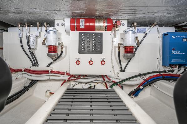 Slide: The Image of Engine room of 2020 Tiara Yachts 39 Coupe with fire suppression system and wiring. - 48