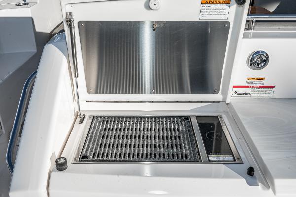 Slide: The Image of Outdoor grill on 2020 Tiara Yachts 39 Coupe, featuring stainless steel design. - 8