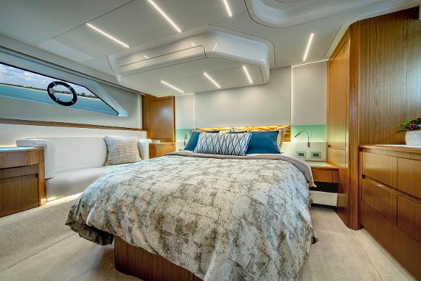 Slide: The Image of Luxurious 2025 Tiara Yachts EX 60 bedroom with modern design and elegant lighting. - 37