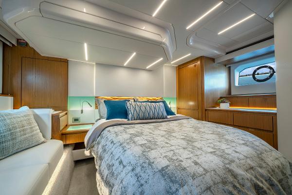 Slide: The Image of Luxurious 2025 Tiara Yachts EX 60 bedroom with modern design and ambient lighting. - 40