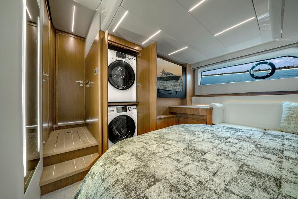 Slide: The Image of Luxurious 2025 Tiara Yachts EX 60 interior with bedroom and laundry area. - 48