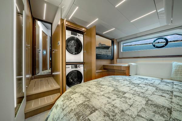 Slide: The Image of Luxurious 2025 Tiara Yachts EX 60 cabin with modern amenities and elegant design. - 49