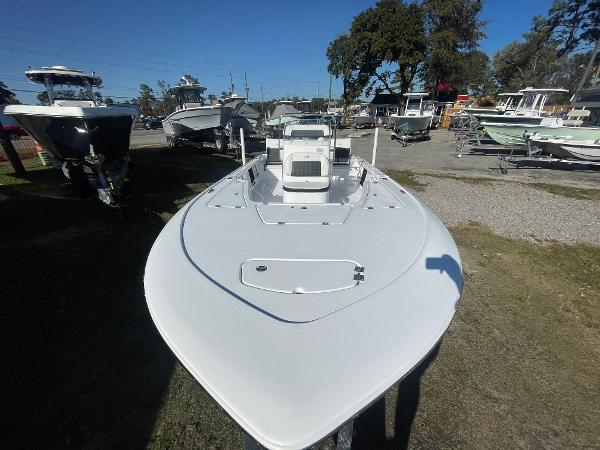 Slide: The Image of 2024 Tidewater 1910 Bay Max boat displayed outdoors on a sunny day. - 10