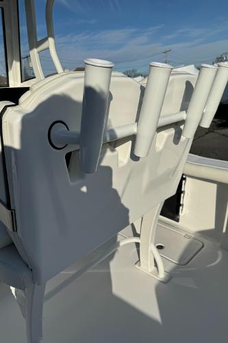 Slide: The Image of 2024 Tidewater 256 LXF boat with rod holders and seating. - 17