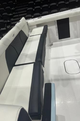Slide: The Image of 2024 Tidewater 256 LXF boat interior seating and deck view. - 22