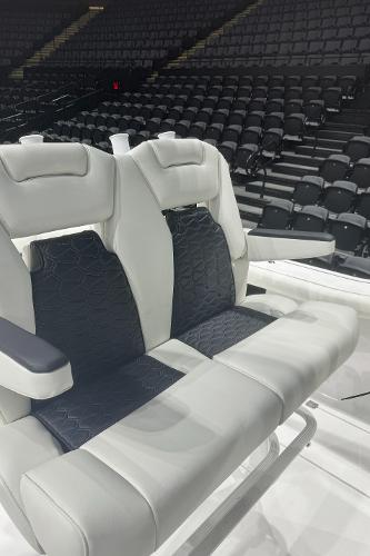 Slide: The Image of 2024 Tidewater 256 LXF boat seats in a showroom. - 23