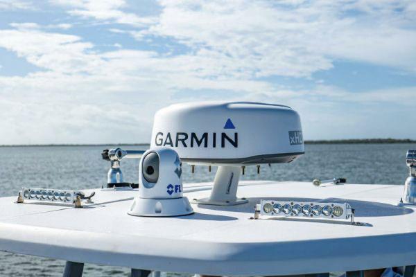 Slide: The Image of Tidewater 320 CC Adventure 2020 boat with Garmin radar and FLIR camera on the roof. - 12