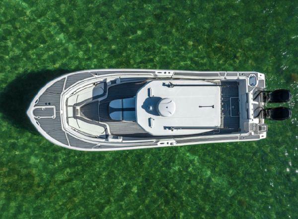 Slide: The Image of Aerial view of 2020 Tidewater 320 CC Adventure boat on clear green water. - 26