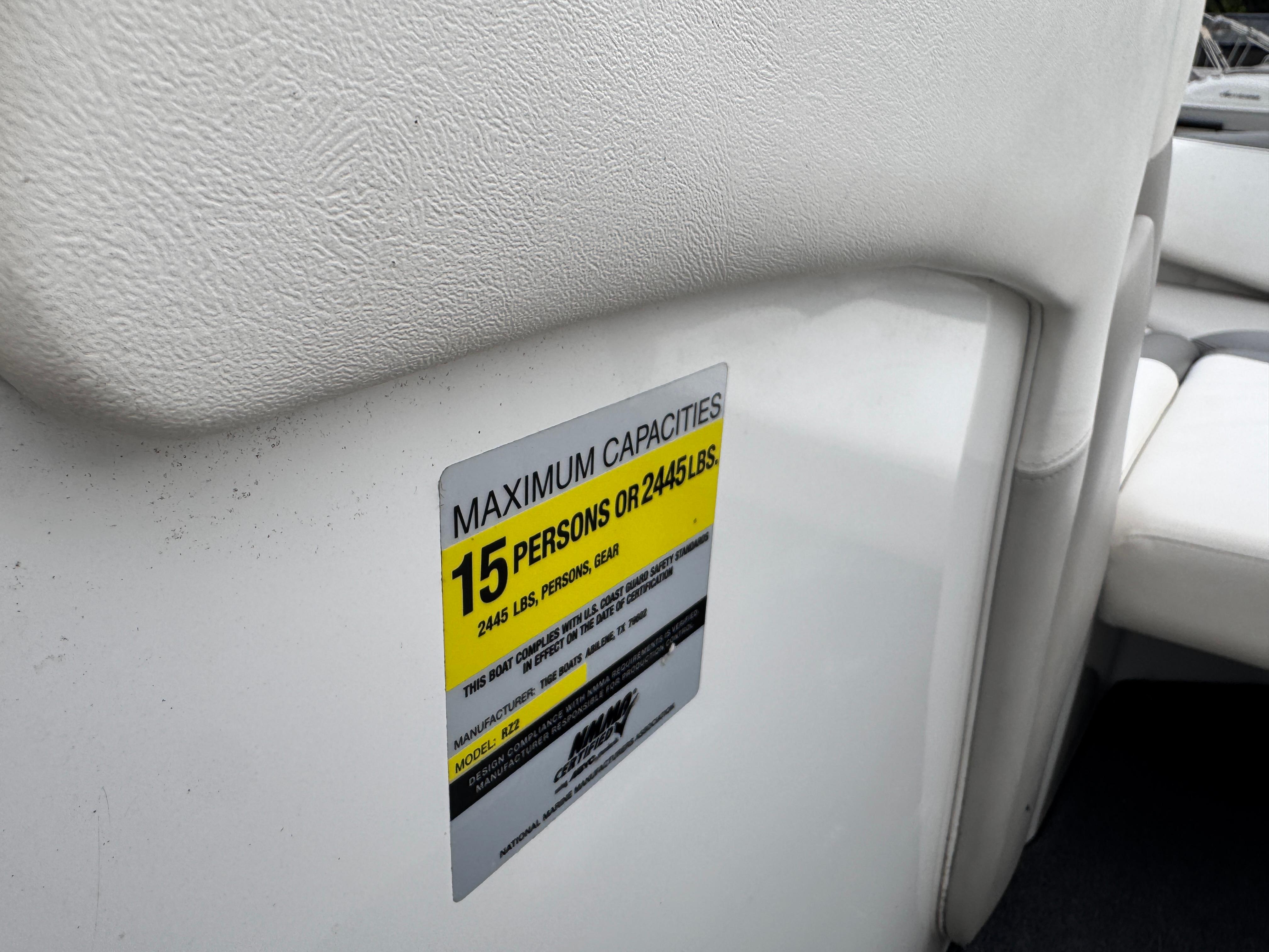 Slide: The Image of 2007 Tigé RZ2 boat capacity label, seating for 15 people or 2445 lbs. - 14