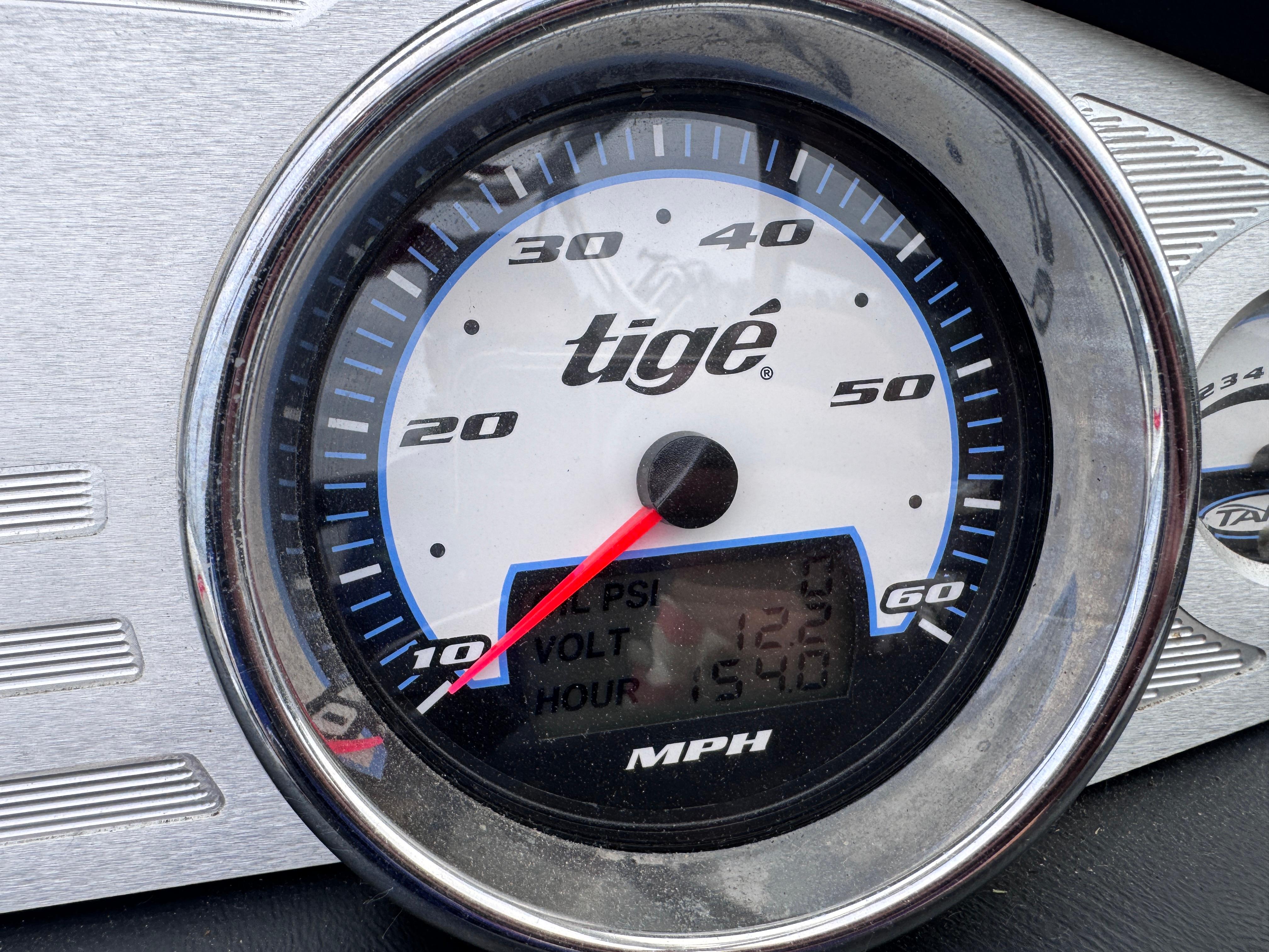 Slide: The Image of 2007 Tigé RZ2 speedometer displaying speed in MPH with digital readout. - 15