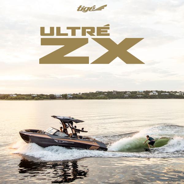 Slide: The Image of 2024 Tigé ULTRA ZX 23 and 25 boat with wakeboarder on a lake. - 5