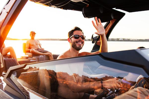 Slide: The Image of 2024 Tigé ULTRA ZX 23 and 25 boat with happy passengers enjoying a sunny day. - 8
