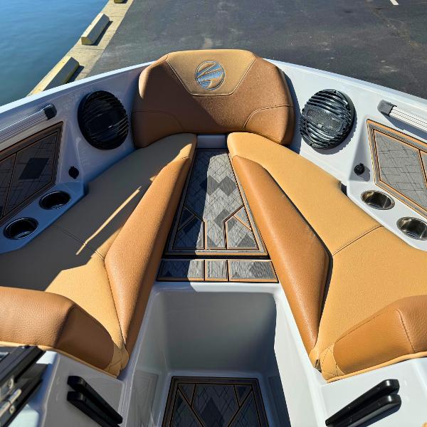 Slide: The Image of 2024 Tigé Z1 boat interior with tan seating and modern design. - 15