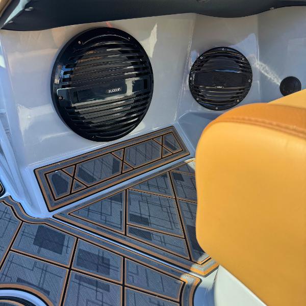 Slide: The Image of 2024 Tigé Z1 boat interior with custom flooring and audio system. - 9