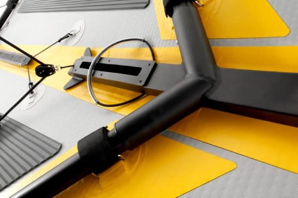Slide: The Image of Close-up of 2022 Tiwal 3 Sailboat deck with yellow and black components. - 2