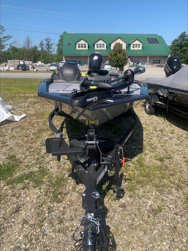Slide: The Image of 2024 Tracker PT 195 XTE fishing boat on trailer in outdoor setting. - 2