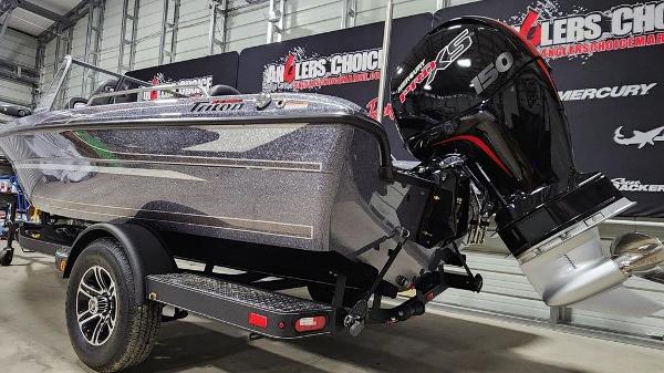 Slide: The Image of 2024 Triton 186 Allure boat with Mercury 150 Pro XS engine in showroom. - 9