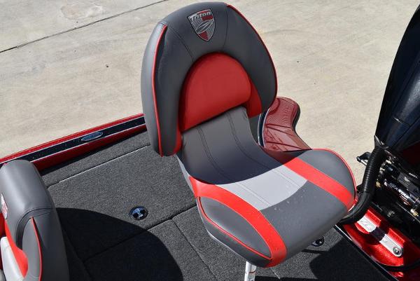 Slide: The Image of 2024 Triton 18 TrX boat seat, red and gray, ergonomic design. - 16