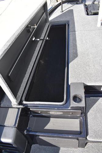 Slide: The Image of 2024 Triton 18 TrX boat storage compartment. - 17