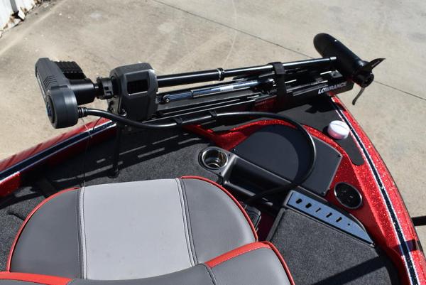 Slide: The Image of 2024 Triton 18 TrX boat deck with Lowrance trolling motor. - 18